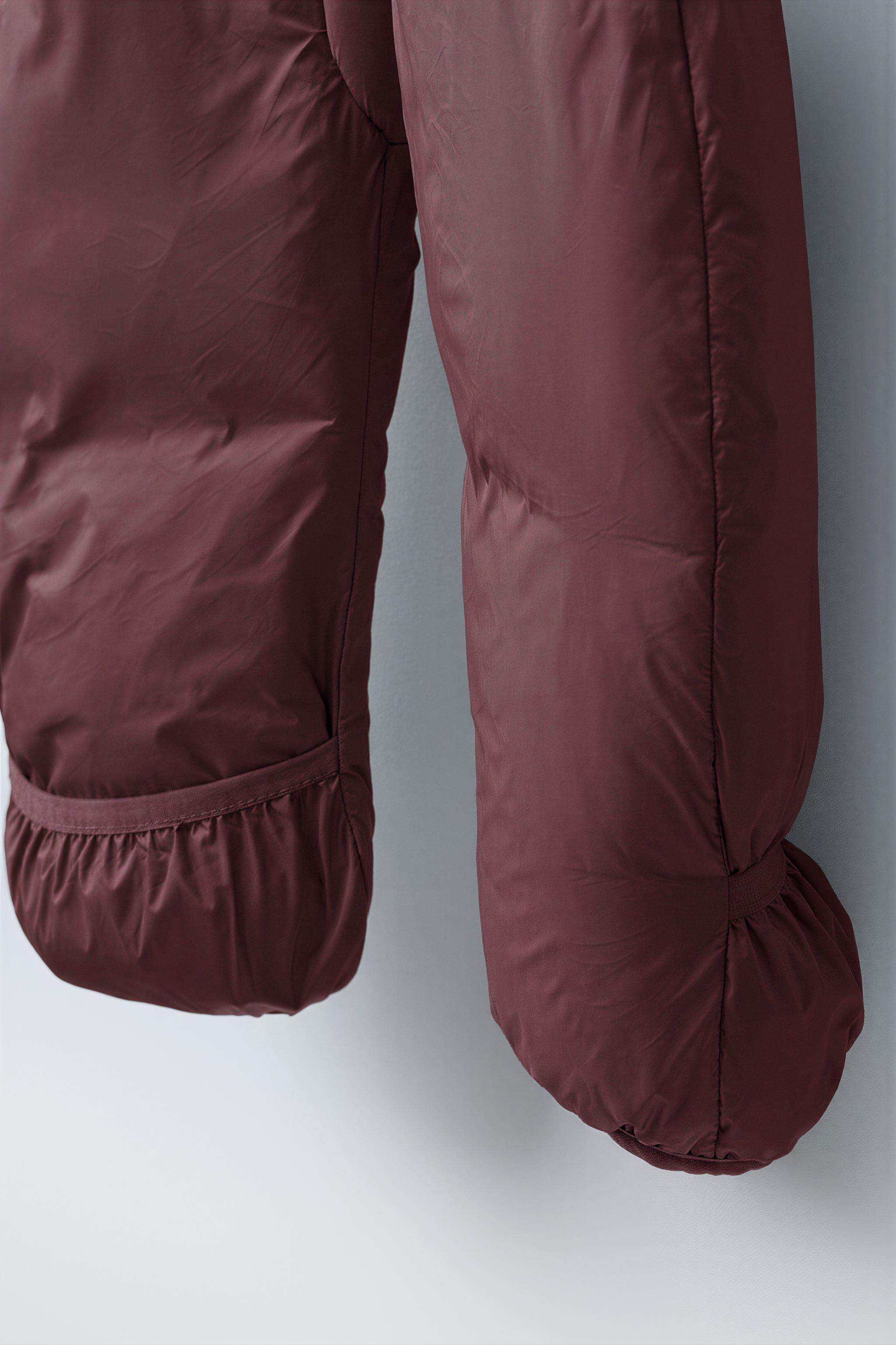 COMBINAISON EN NYLON PIEDS CONVERTIBLES